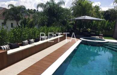 Imagem: A casa em condomínio possui 5 Dormitórios, 5 Banheiros, 4