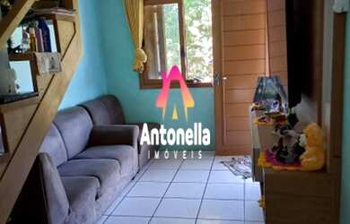 Imagem: A casa possui 3 Dormitórios, 2 Banheiros, 1 Vaga na garagem