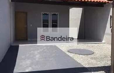 Imagem: A casa possui 3 Dormitórios, 2 Banheiros, 3 Vagas na garagem