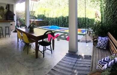 Imagem: A casa em condomínio possui 3 Dormitórios, 4 Banheiros, 2