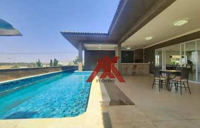 Imagem: A casa em condomínio possui 4 Dormitórios, 4 Banheiros, 3