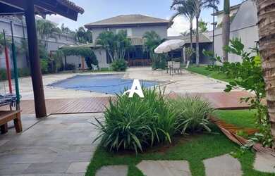 Imagem: A casa possui 5 Dormitórios, 5 Banheiros, 5 Vagas na garagem