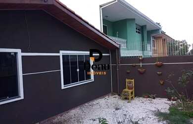 Imagem: A casa possui 3 Dormitórios, 1 Banheiro, 2 Vagas na garagem