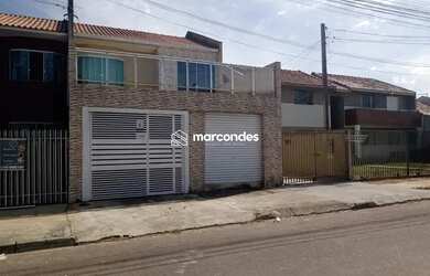 Imagem: A casa possui 3 Dormitórios, 2 Banheiros, 1 Vaga na garagem