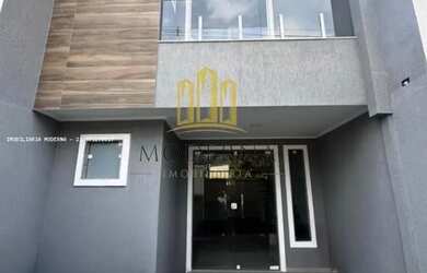 Imagem: A casa possui 2 Dormitórios, 3 Banheiros, 1 Vaga na garagem