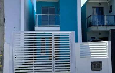 Imagem: A casa possui 3 Dormitórios, 3 Banheiros, 1 Vaga na garagem