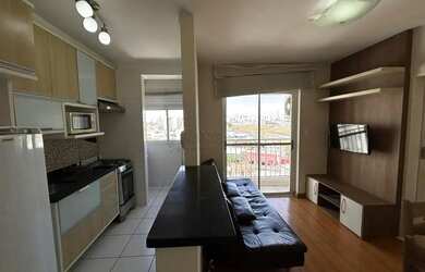 Imagem: O apartamento possui 2 Dormitórios, 1 Banheiro, 1 Vaga na garagem