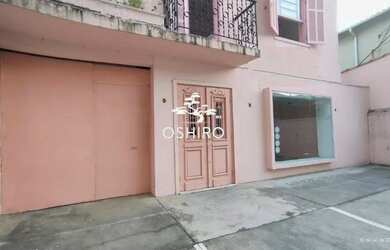 Imagem: A casa possui 4 Dormitórios, 5 Banheiros, 5 Vagas na garagem