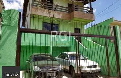 Imagem: A casa possui 4 Dormitórios, 4 Banheiros, 2 Vagas na garagem