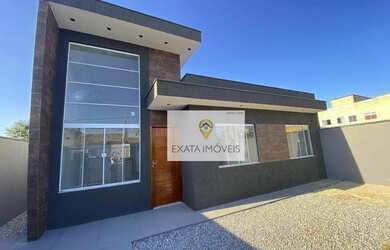 Imagem: A casa possui 3 Dormitórios, 2 Banheiros, 2 Vagas na garagem