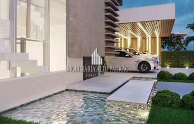 Imagem: A casa em condomínio possui 4 Dormitórios, 5 Banheiros, 5