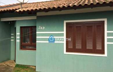 Imagem: A casa possui 2 Dormitórios, 1 Banheiro, 1 Vaga na garagem