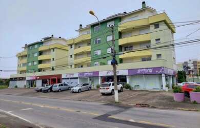 Imagem: O apartamento possui 3 Dormitórios, 1 Banheiro, 2 Vagas na