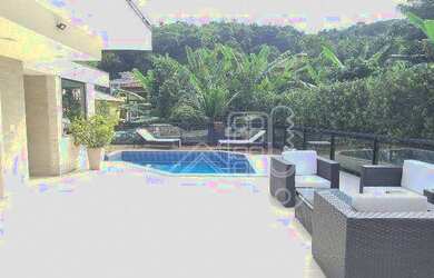 Imagem: A casa em condomínio possui 5 Dormitórios, 5 Banheiros, 2