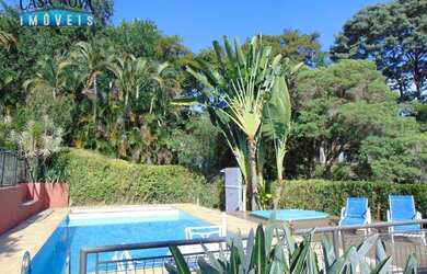 Imagem: A casa em condomínio à venda possui 4 Dormitórios, 5 Banheiros