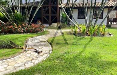 Imagem: A casa possui 4 Dormitórios, 4 Banheiros, 4 Vagas na garagem