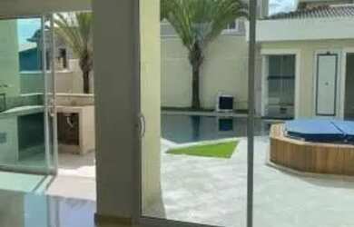 Imagem: A casa em condomínio possui 4 Dormitórios, 5 Banheiros, 5