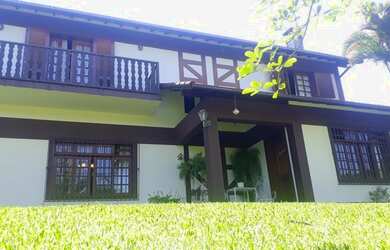 Imagem: A casa possui 5 Dormitórios, 5 Banheiros, 5 Vagas na garagem