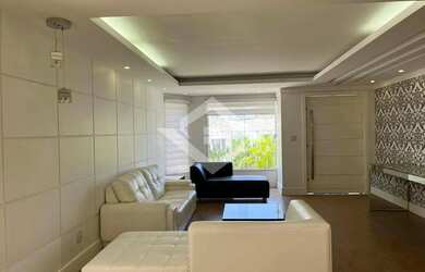 Imagem: A casa possui 5 Dormitórios, 5 Banheiros, 4 Vagas na garagem