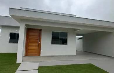 Imagem: A casa possui 2 Dormitórios, 2 Banheiros, 3 Vagas na garagem