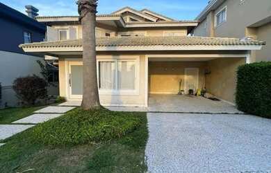 Imagem: A casa em condomínio possui 4 Dormitórios, 5 Banheiros, 5