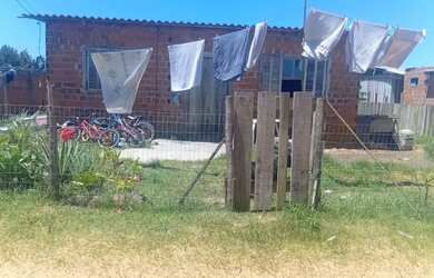 Imagem: A casa à venda possui 3 Dormitórios, 1 Banheiro, 3 Vagas na