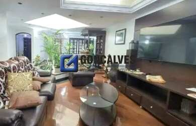 Imagem: A casa possui 4 Dormitórios, 5 Banheiros, 2 Vagas na garagem