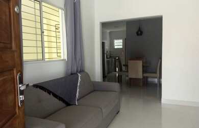 Imagem: A casa possui 3 Dormitórios, 2 Banheiros, 2 Vagas na garagem