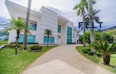 Imagem: A casa em condomínio possui 5 Dormitórios, 5 Banheiros, 5