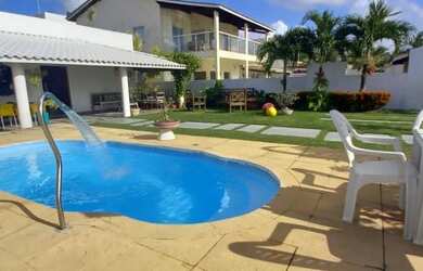 Imagem: A casa possui 2 Dormitórios, 3 Vagas na garagem e está localizado