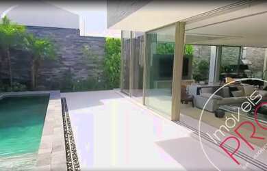 Imagem: A casa em condomínio à venda possui 4 Dormitórios, 5 Banheiros