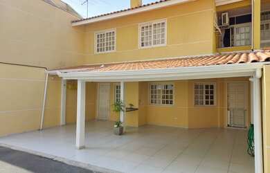 Imagem 1: Sobrado em Condominio Novo Mundo 3Q 1 Suite e 3 Vagas de Garagem