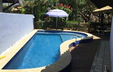 Imagem: A casa possui 5 Dormitórios, 5 Banheiros, 3 Vagas na garagem