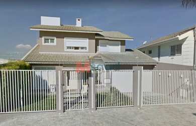 Imagem: A casa em condomínio possui 3 Dormitórios, 2 Banheiros, 5