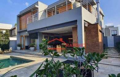 Imagem: A casa em condomínio possui 3 Dormitórios, 5 Banheiros, 5