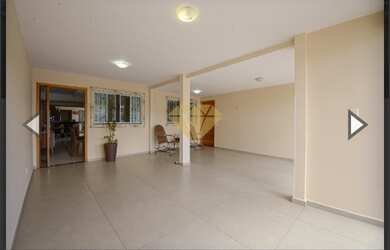 Imagem: A casa possui 3 Dormitórios, 4 Banheiros, 4 Vagas na garagem