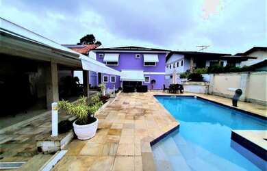 Imagem: A casa em condomínio possui 4 Dormitórios, 5 Banheiros, 4