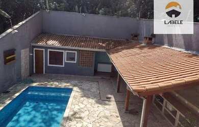 Imagem: A casa em condomínio possui 4 Dormitórios, 4 Banheiros, 5