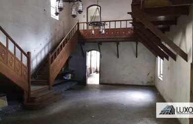 Imagem: A casa possui 3 Dormitórios, 5 Banheiros, 5 Vagas na garagem