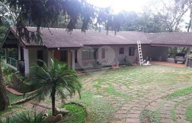 Imagem: A casa possui 3 Dormitórios, 5 Banheiros, 5 Vagas na garagem