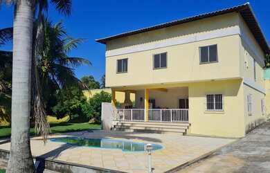 Imagem: A casa possui 5 Dormitórios, 4 Banheiros, 5 Vagas na garagem