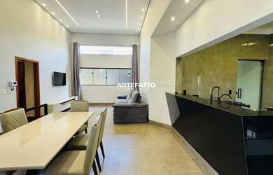 Imagem: A casa possui 3 Dormitórios, 4 Banheiros, 5 Vagas na garagem