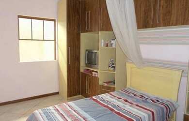 Imagem: A casa possui 3 Dormitórios, 2 Banheiros, 2 Vagas na garagem