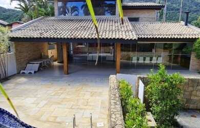 Imagem: A casa possui 5 Dormitórios, 5 Banheiros, 3 Vagas na garagem