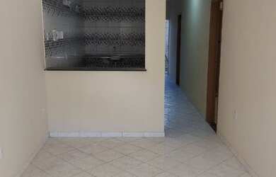 Imagem: A casa possui 2 Dormitórios, 1 Banheiro, 1 Vaga na garagem