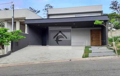 Imagem: A casa possui 3 Dormitórios, 4 Banheiros, 3 Vagas na garagem