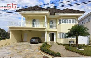 Imagem: A casa em condomínio possui 4 Dormitórios, 5 Banheiros, 5