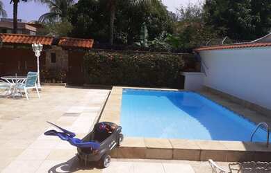 Imagem: A casa em condomínio possui 5 Dormitórios, 5 Banheiros, 3