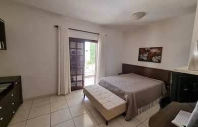 Imagem: A casa em condomínio possui 3 Dormitórios, 4 Banheiros, 311m²