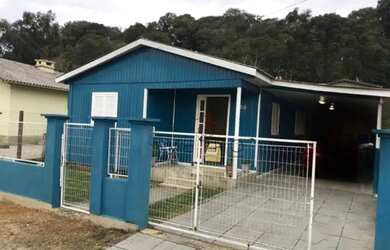 Imagem: A casa possui 5 Dormitórios, 3 Banheiros, 1 Vaga na garagem